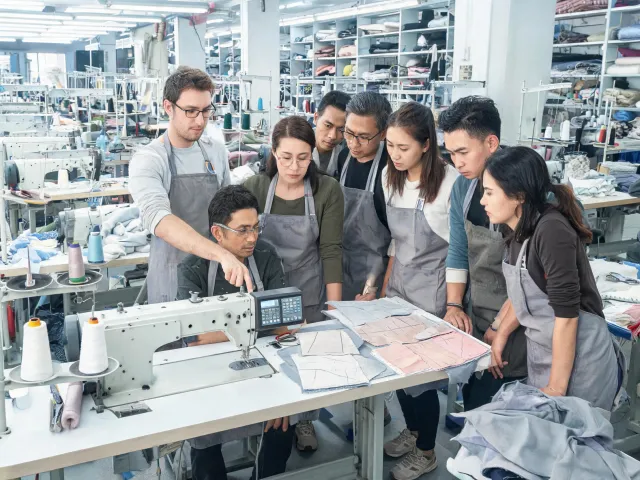 Sewing machine operator training with marked sample pieces
